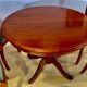 Round or oval table with four chairs in solid cherry, with extensions