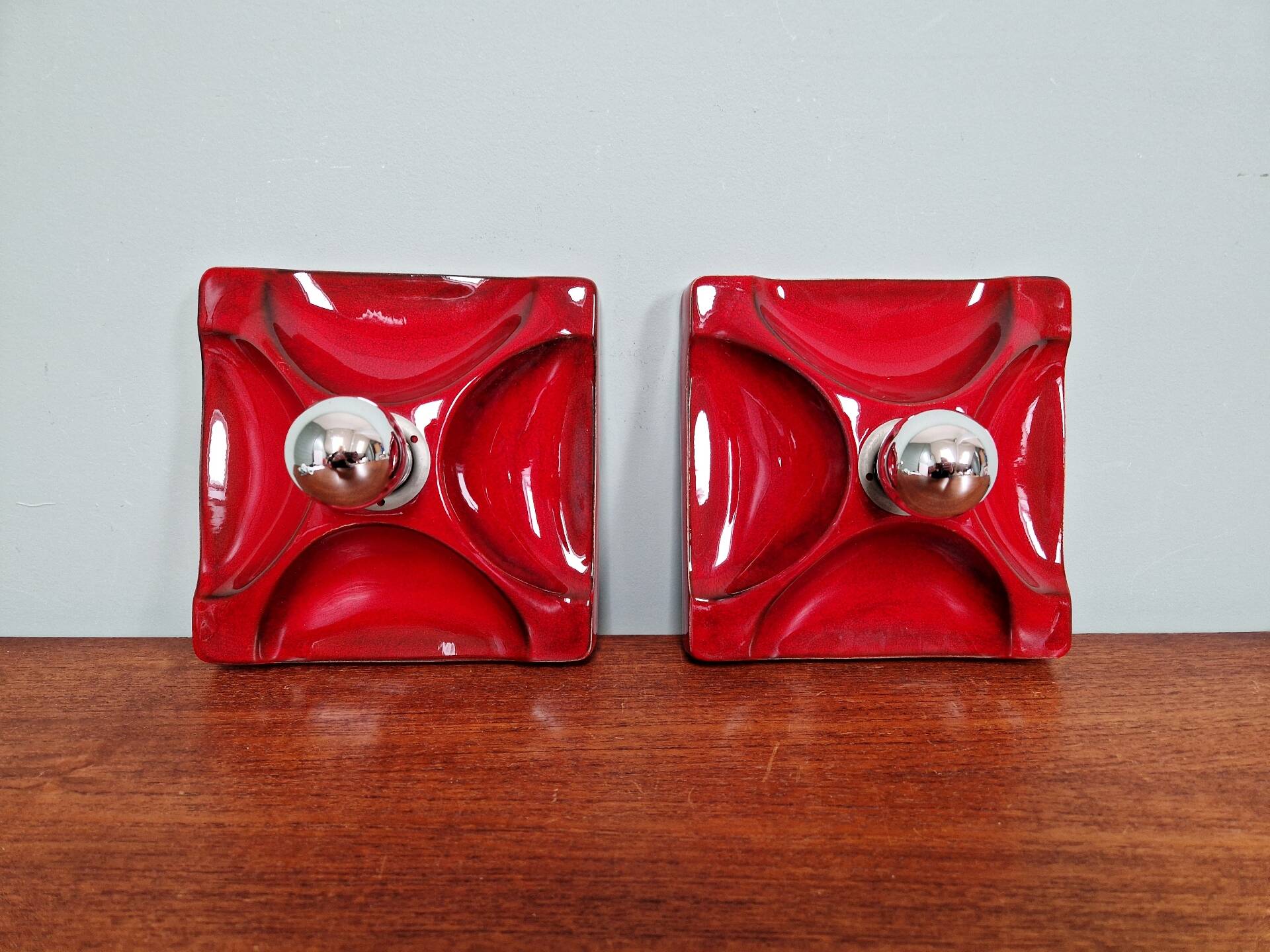 Pair of Space Age wall sconces in red ceramic, 1970.