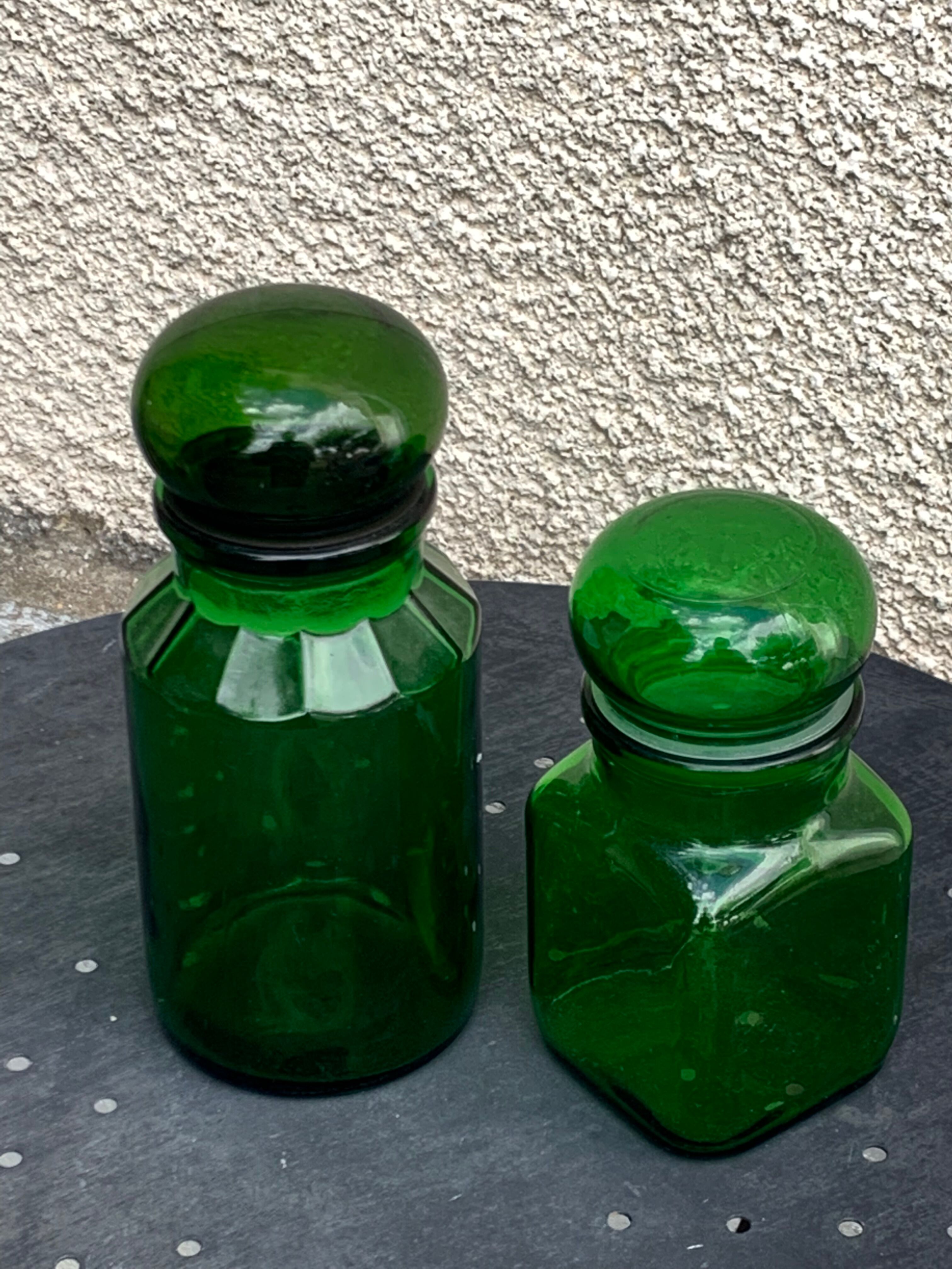 Two jars in green glass advertising vintage 1970