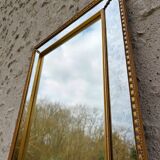 Mirror with glazing bead