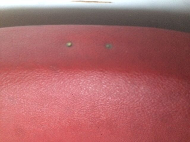 Pair of red skai leather cinema chairs
