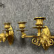 Pair of sconces period Consulate (18th) in gilded bronze with two patinas
