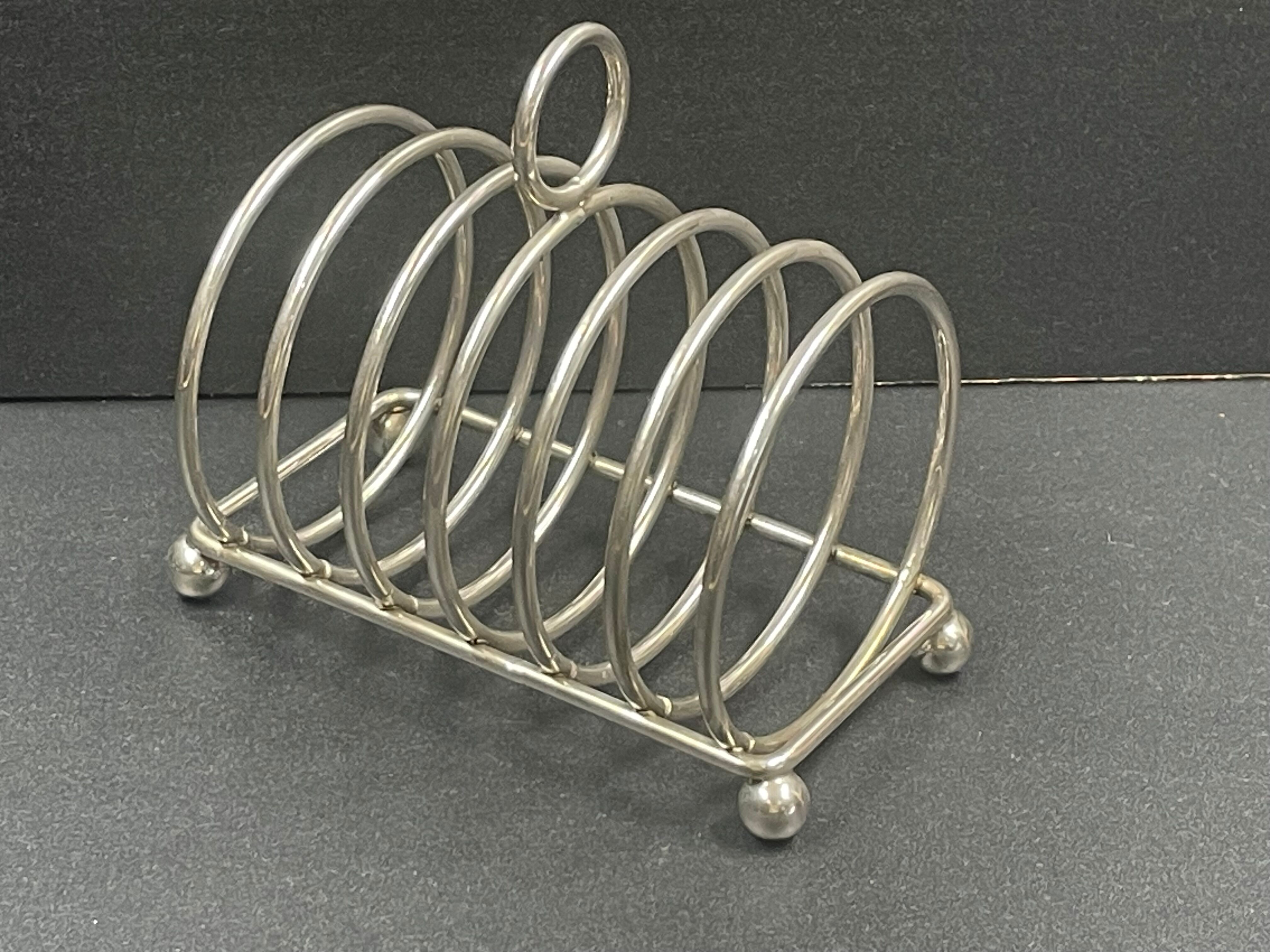 Toast holder in silver metal