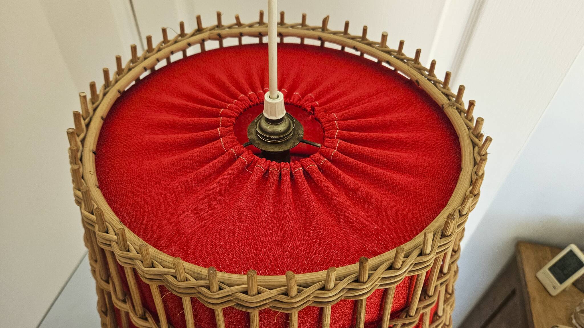 Vintage rattan pendant light - red fabric interior shade from the 60s