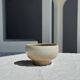 A small speckled grey stoneware bowl D13.5 H8