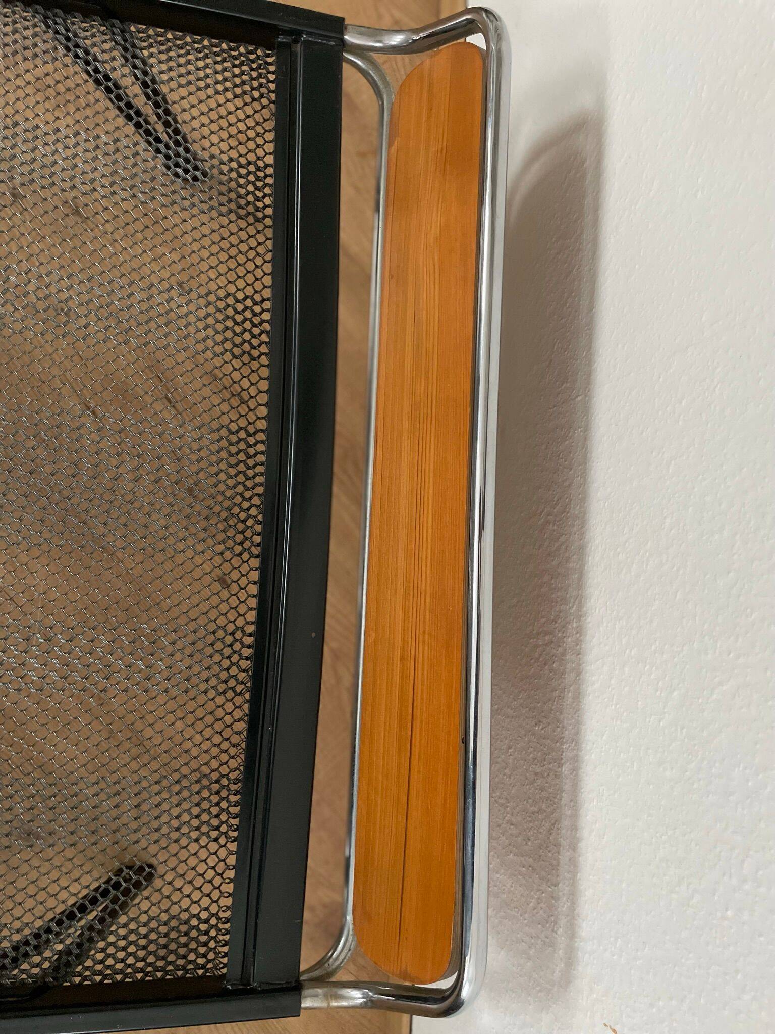 Pair of teak and chrome beds with mattress