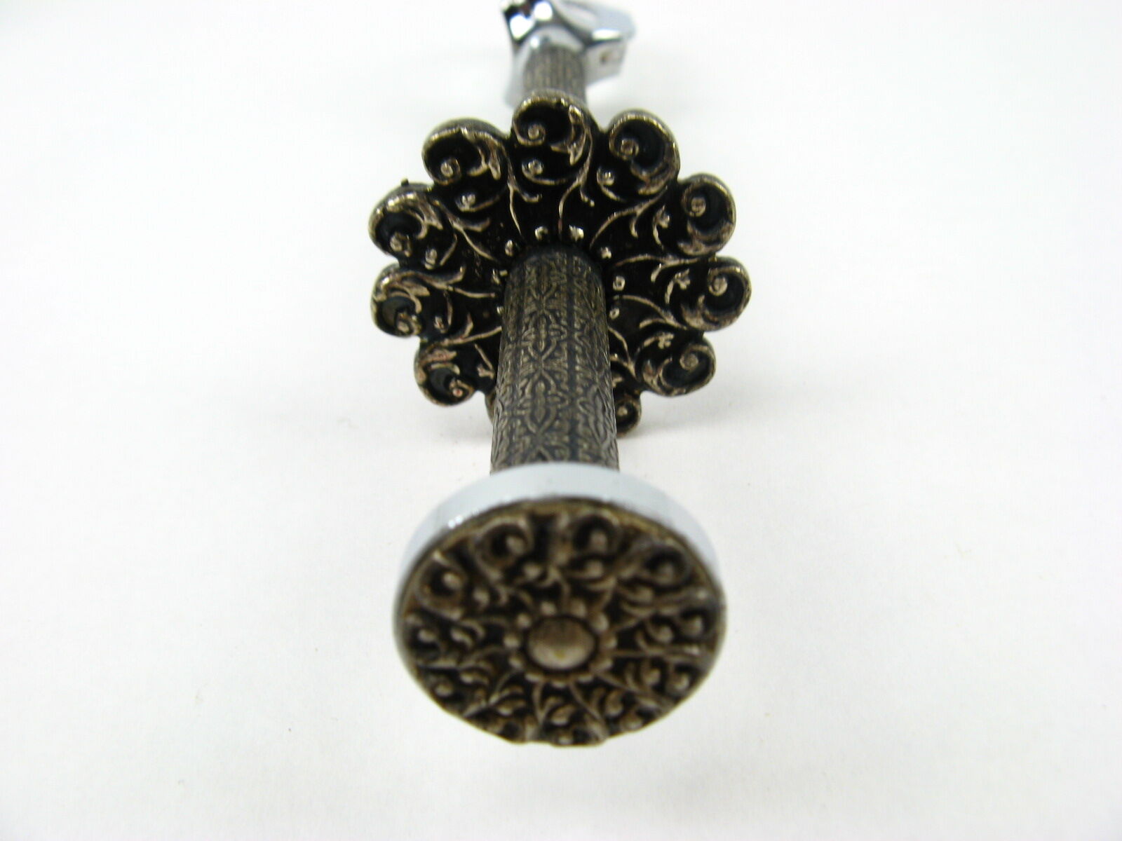 Sugar tongs in its case