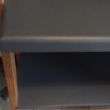 Very fifties console with compass feet