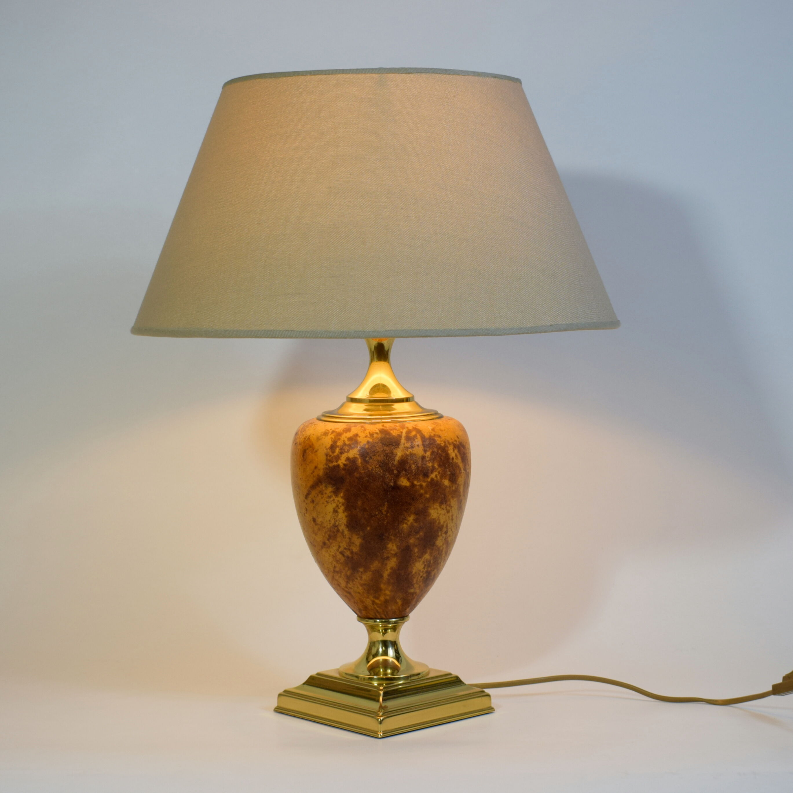 Lamp made of brass and peccari leather