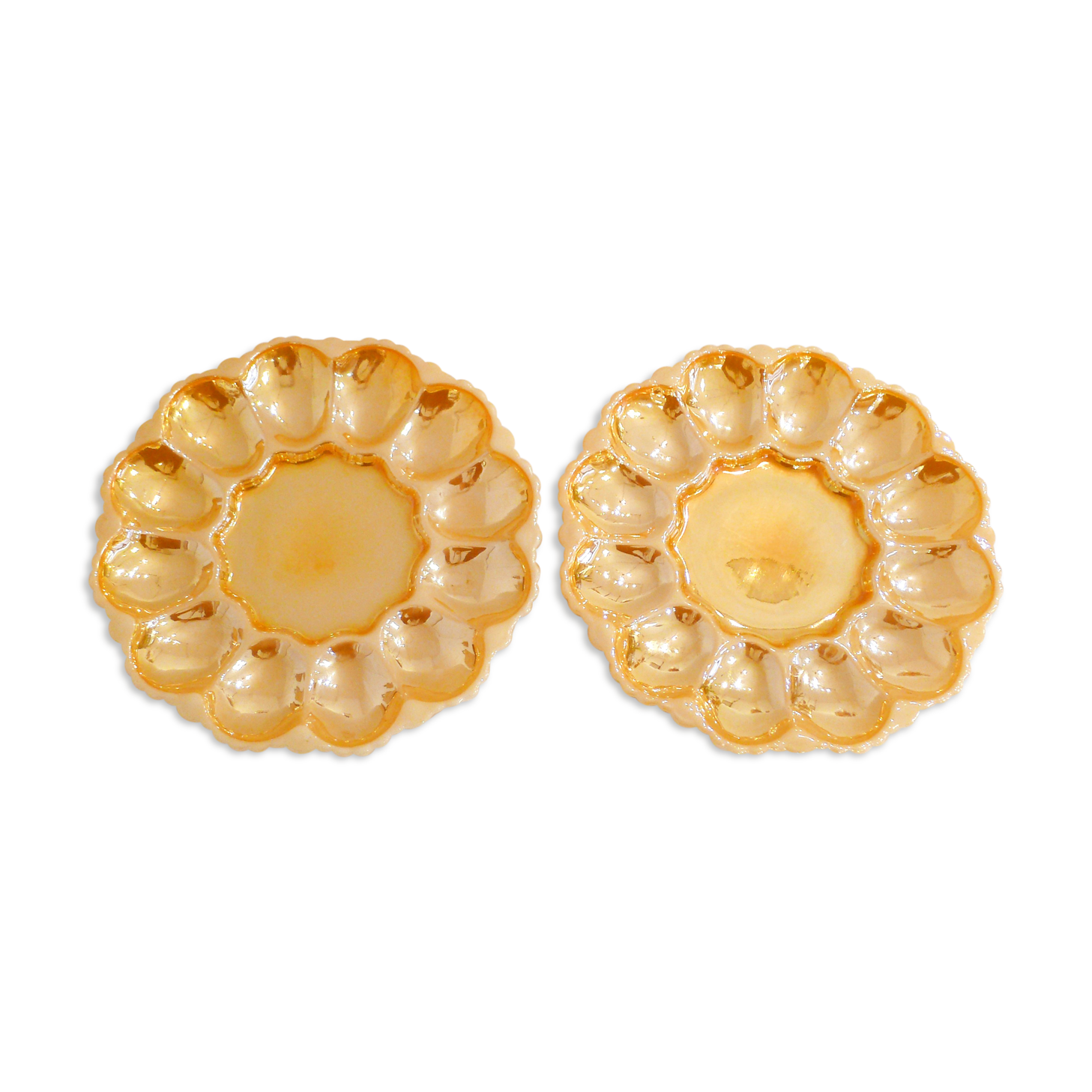 Pair of iridescent orange glass egg plates