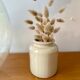 Beige enamelled sandstone pot
