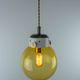 Vintage Mid-Century Modern Industrial Amber Glass And Brass Metal Lamp