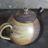 Vintage enameled stoneware potter's teapot