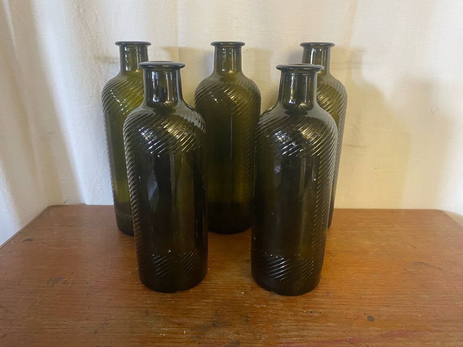 Set of 5 antique carapelli bottles, smoked and ribbed vintage glass