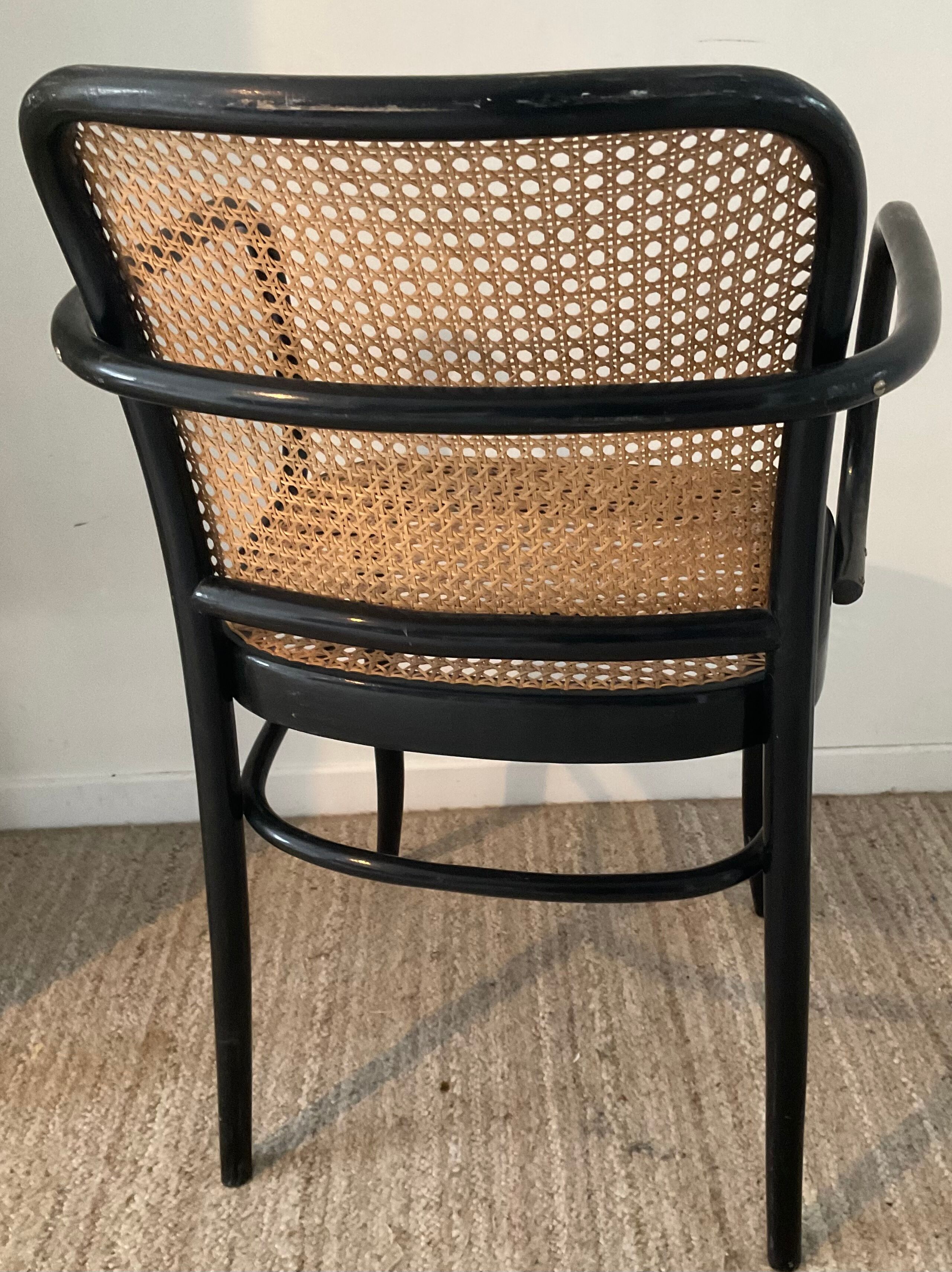 Canned bistro armchair and curved wood from the 60s