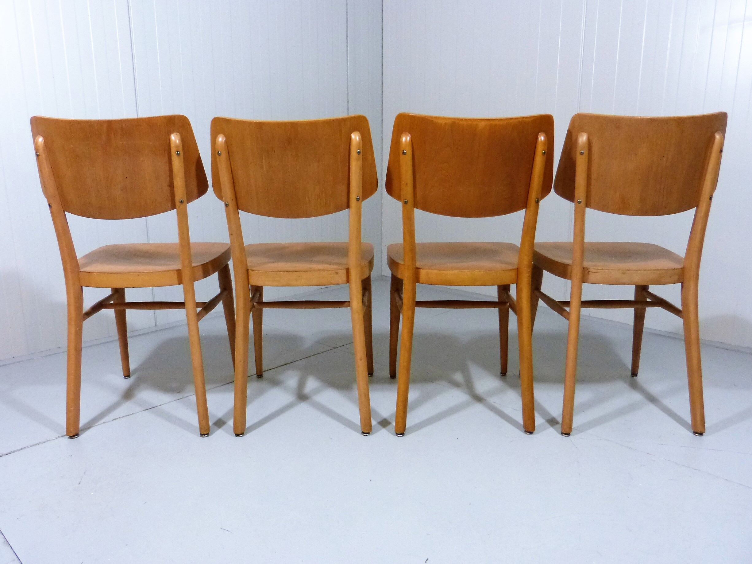Set of 8 wooden dining chairs 1950’s