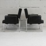 Pair of stainless steel, black leather-like armchairs, France, circa 1970