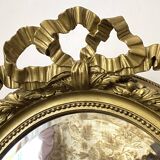 Miroir ancien ovale doré – style Louis XVI avec nœud ruban