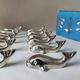 12 silver metal whale knife rests