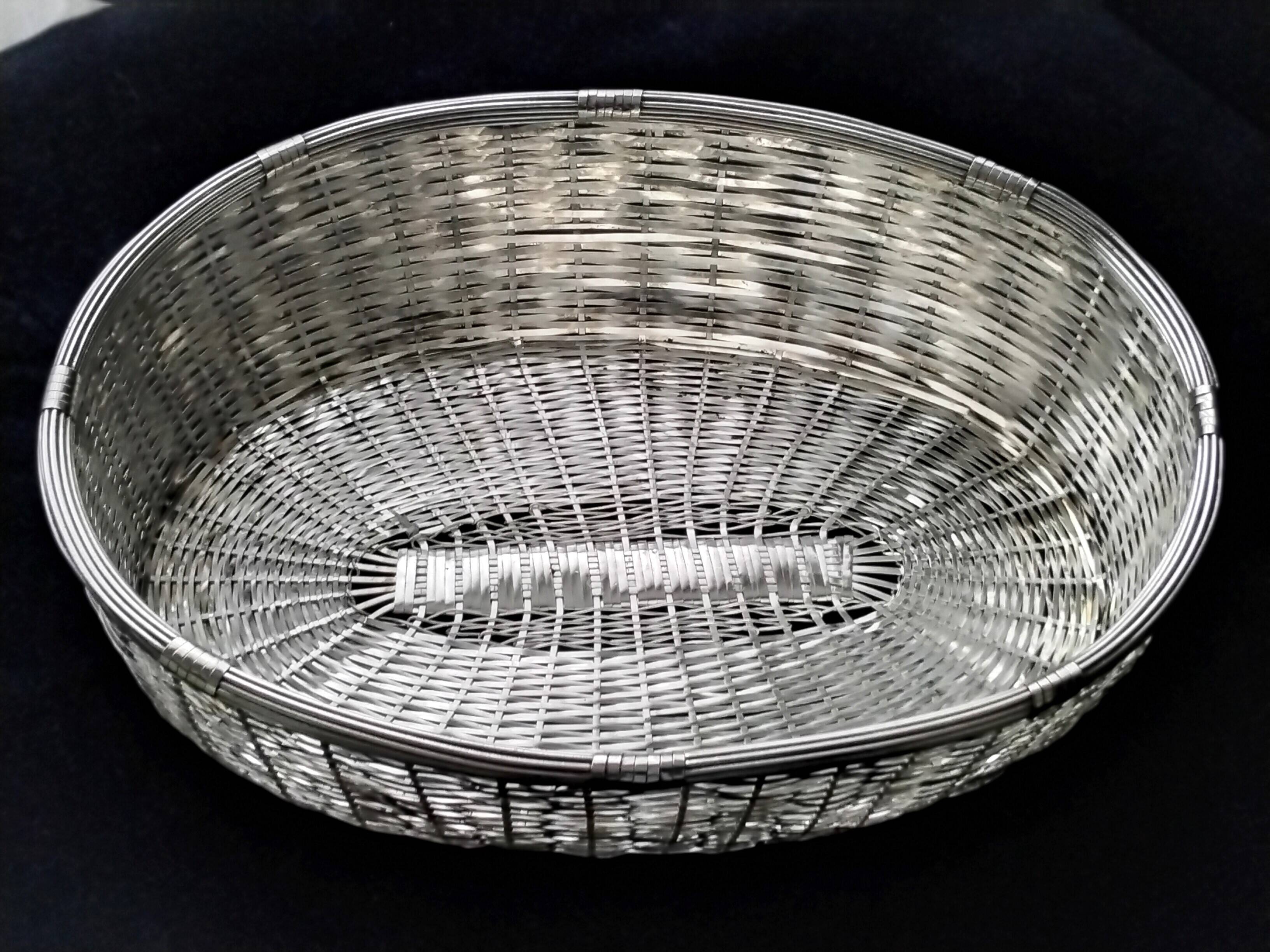 Large basket in braided silver metal wire