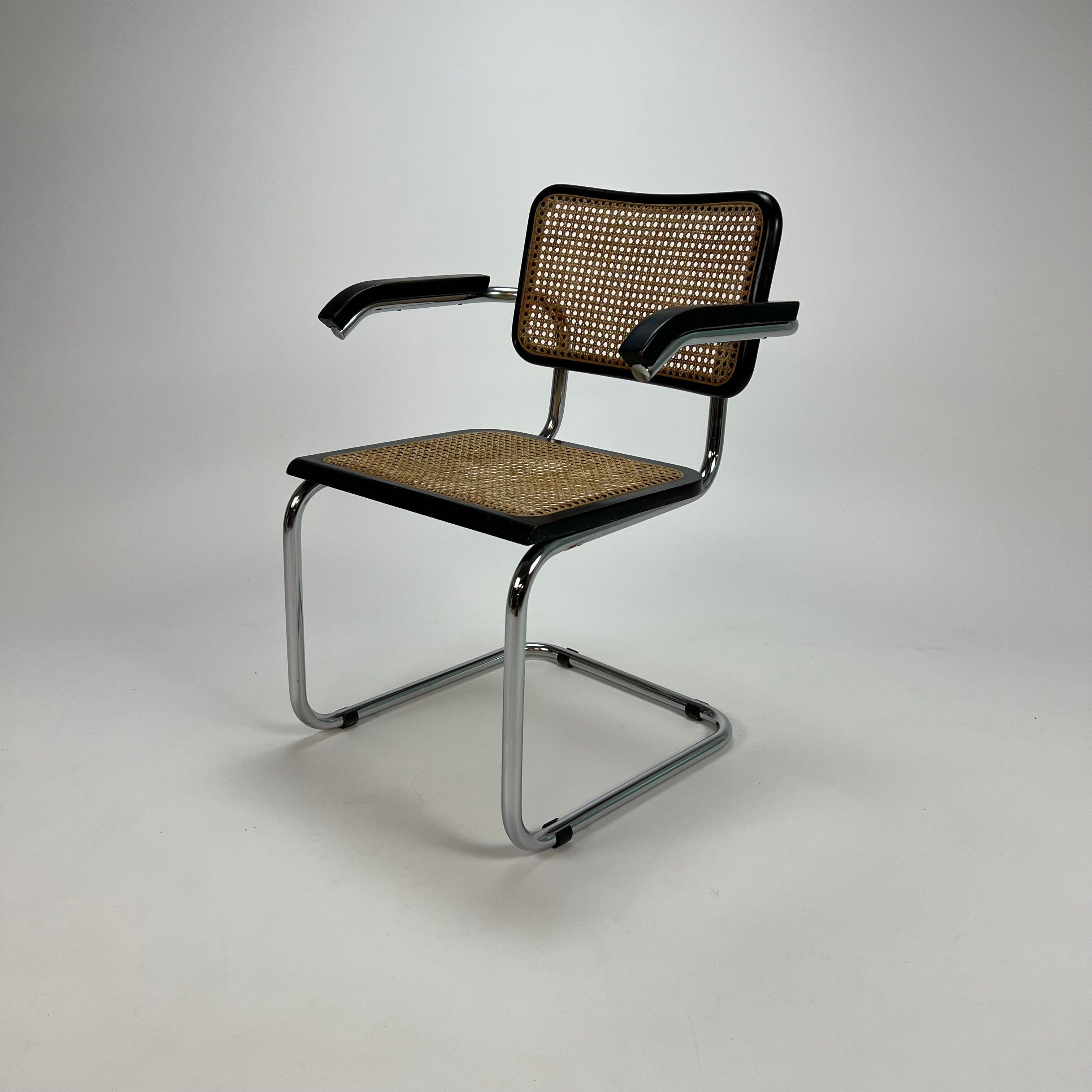 Tubular frame and cane cantilever arm chairs by Marcel Breuer, italy, 1970s