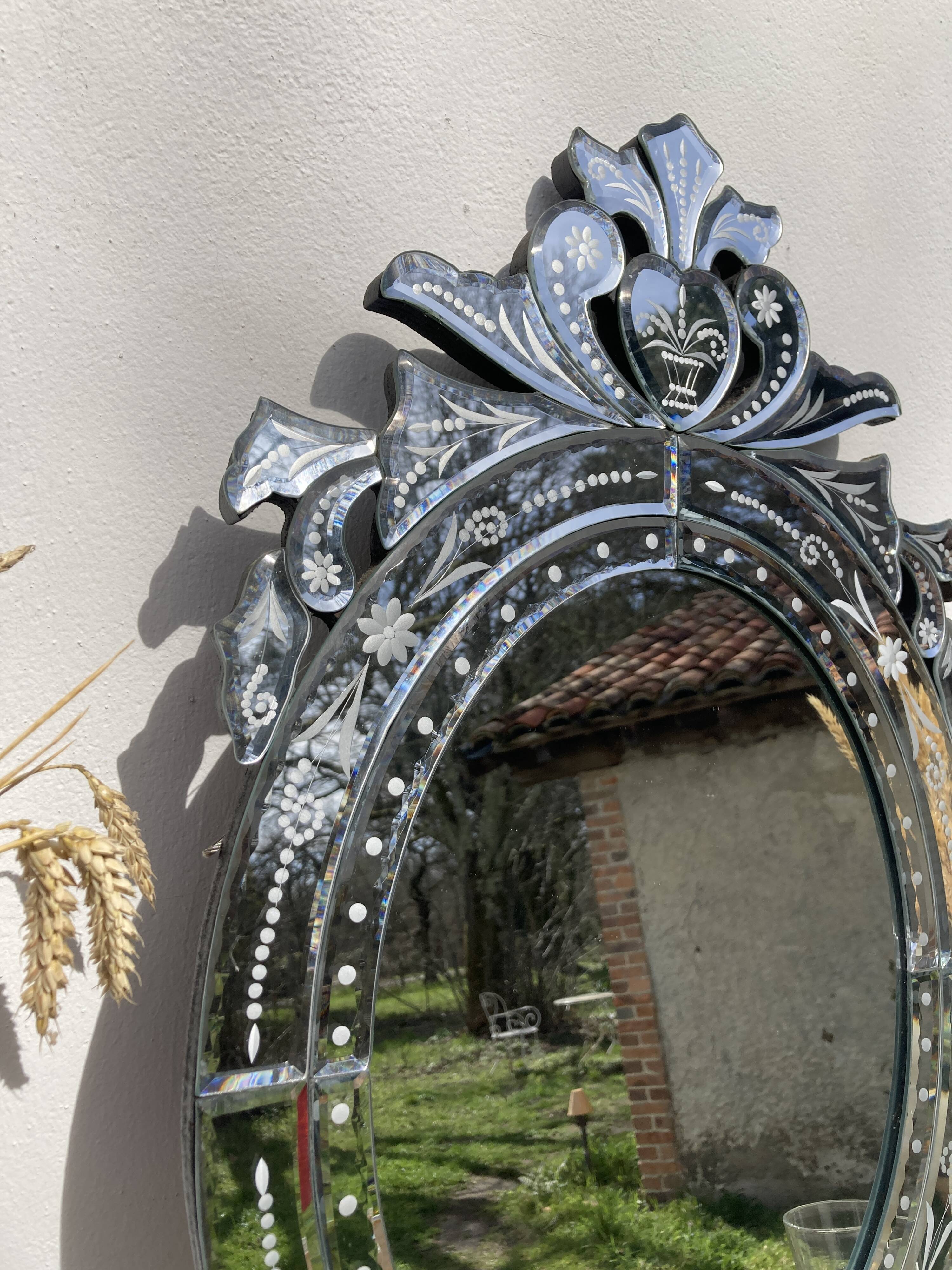 Oval Venetian wall mirror