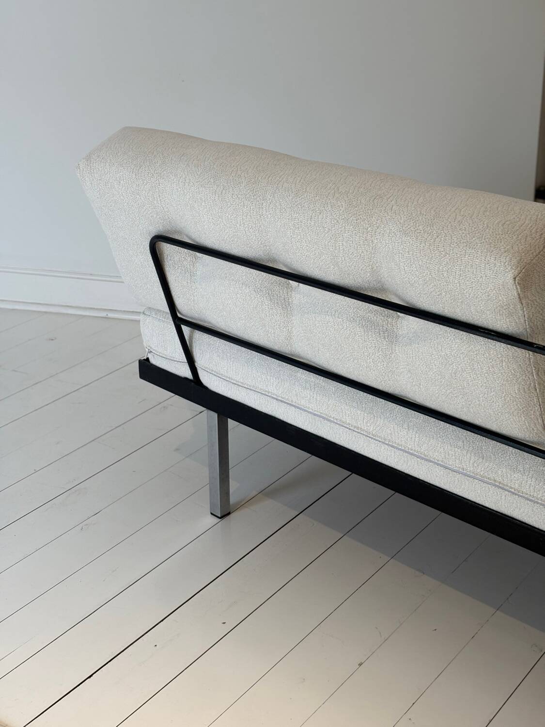 Modernist canapé design – Completely reupholstered in Pierre Frey fabric.