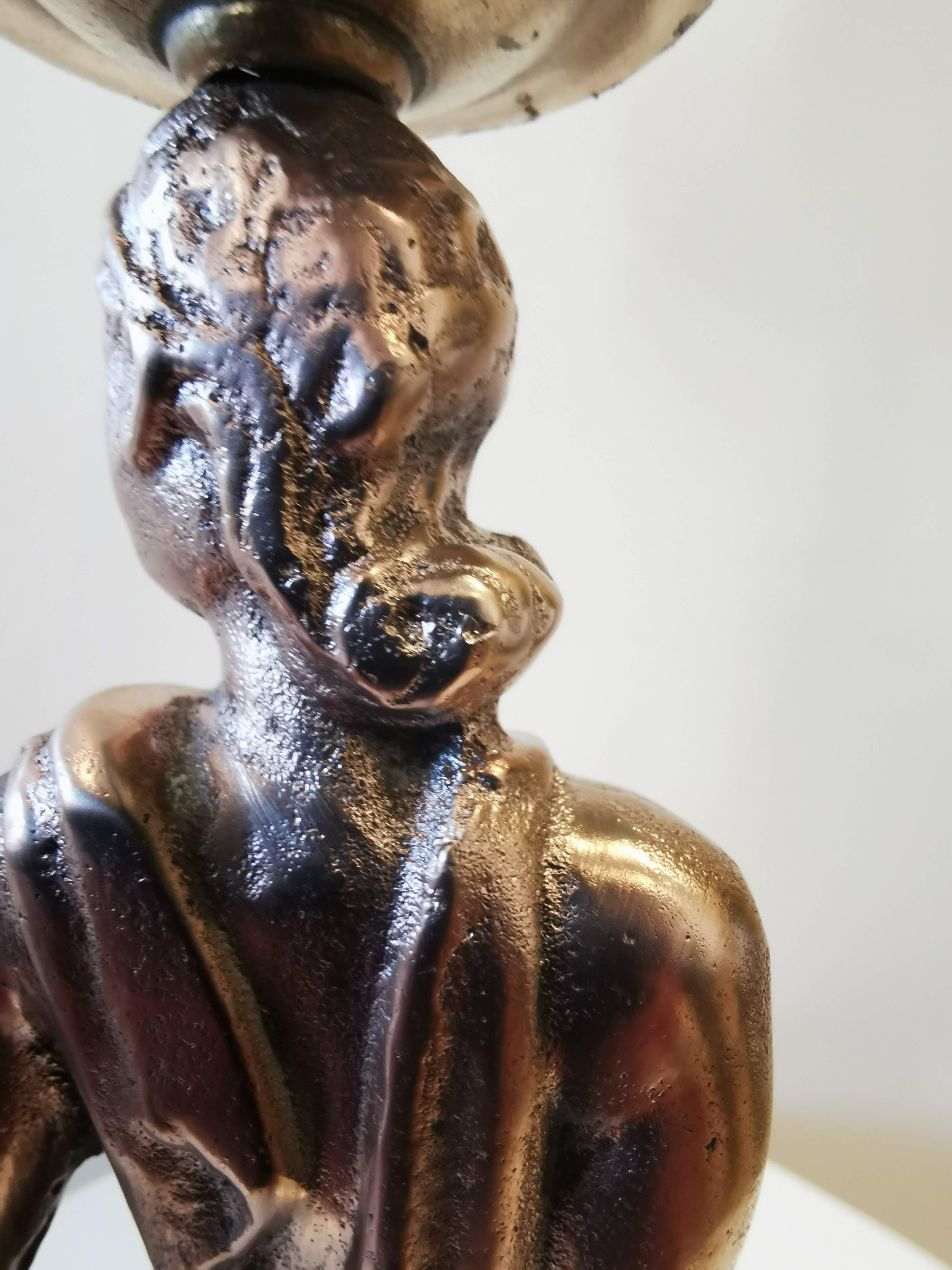Large kerosene lamp mounted on bronze statue. Late nineteenth century