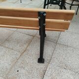 Garden bench with old cast iron legs