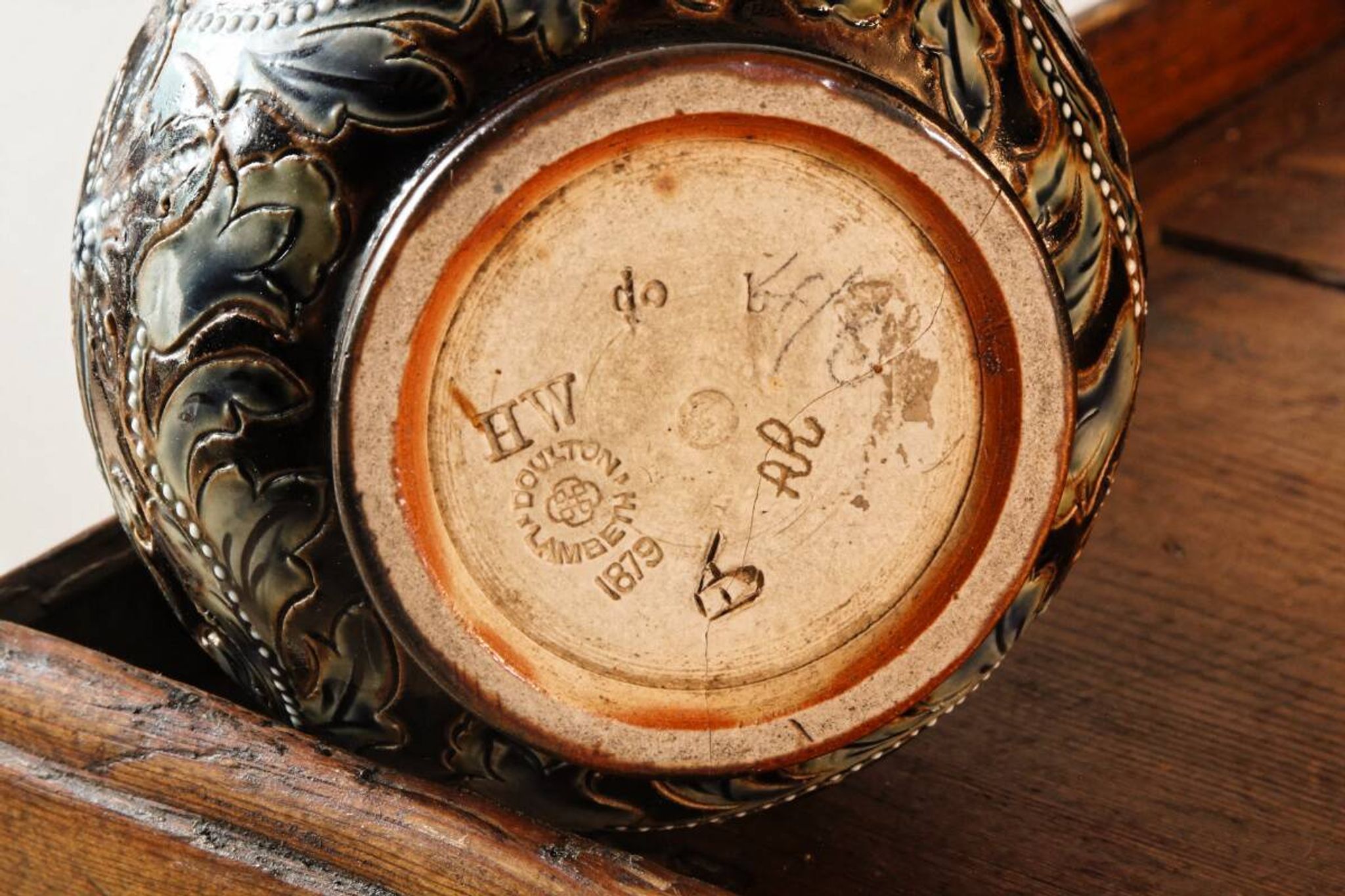Doulton Lambeth stoneware jug (1879), floral decoration by Henry Winstanley.