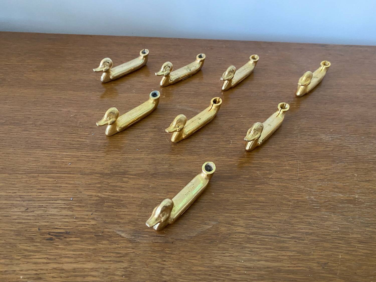 Set of 8 antique privilege knife holders gold metal duck vintage