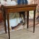 Louis XVI period game table in mahogany and marquetry.