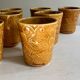 Set of 12 ochre Chavaillon de Sarreguemines cups