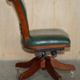 Modern captain's chair in leather, beech frame, adjustable.