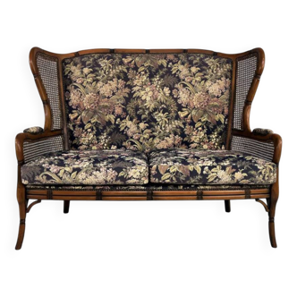 Wingback 2-seater sofa in carved wood, cane and fabric