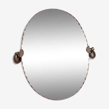 Adjustable oval beveled mirror