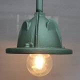 Workshop suspension with metallic green pole