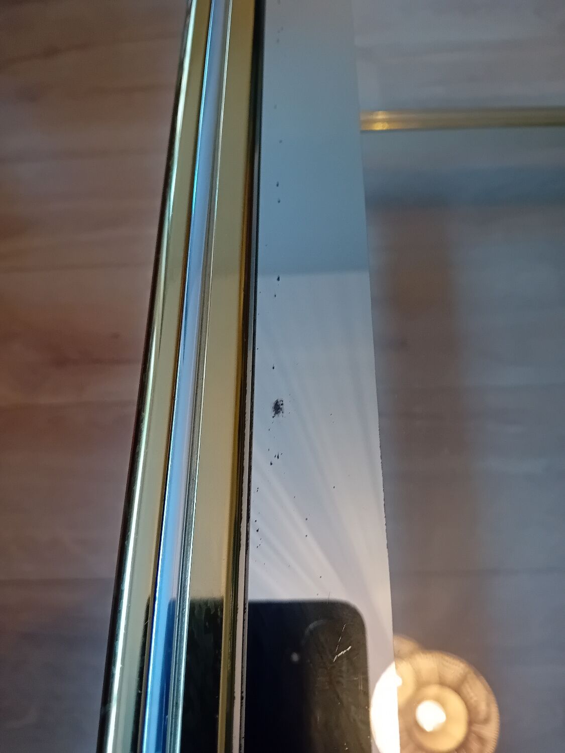 Glass and golden brass coffee table