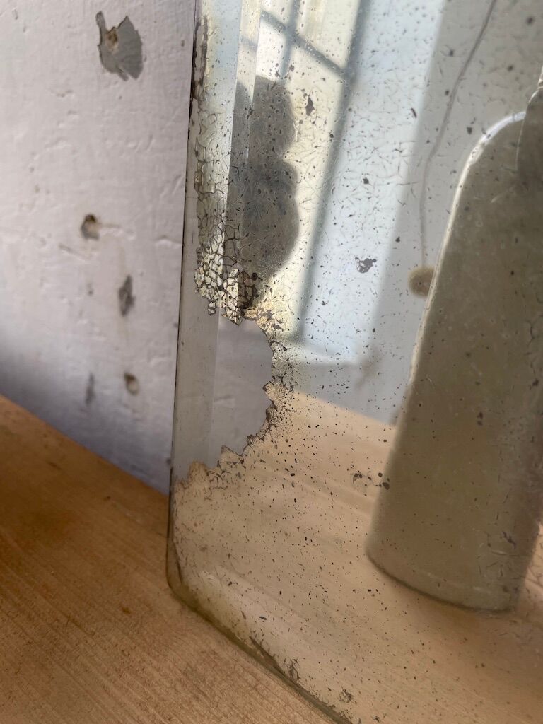 Very stung old bevelled mirror 39x60cm