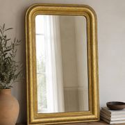 Large antique French gilded mirror with painted floral decoration.