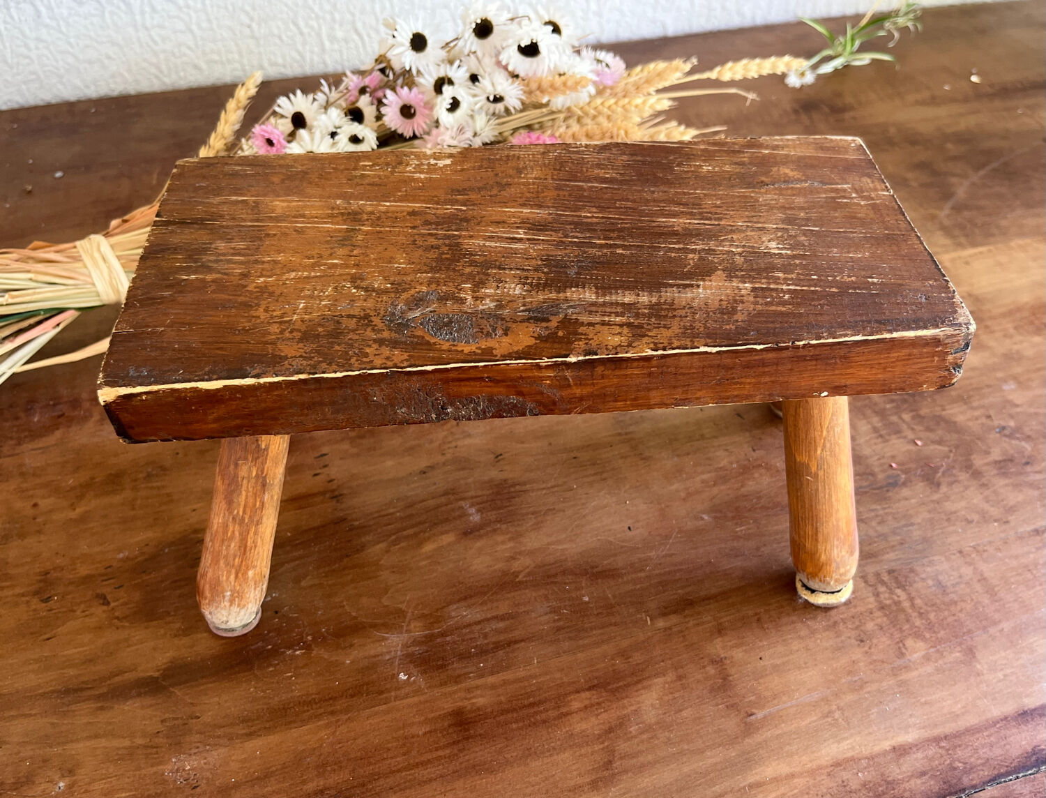 Low wooden stool