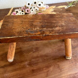 Low wooden stool