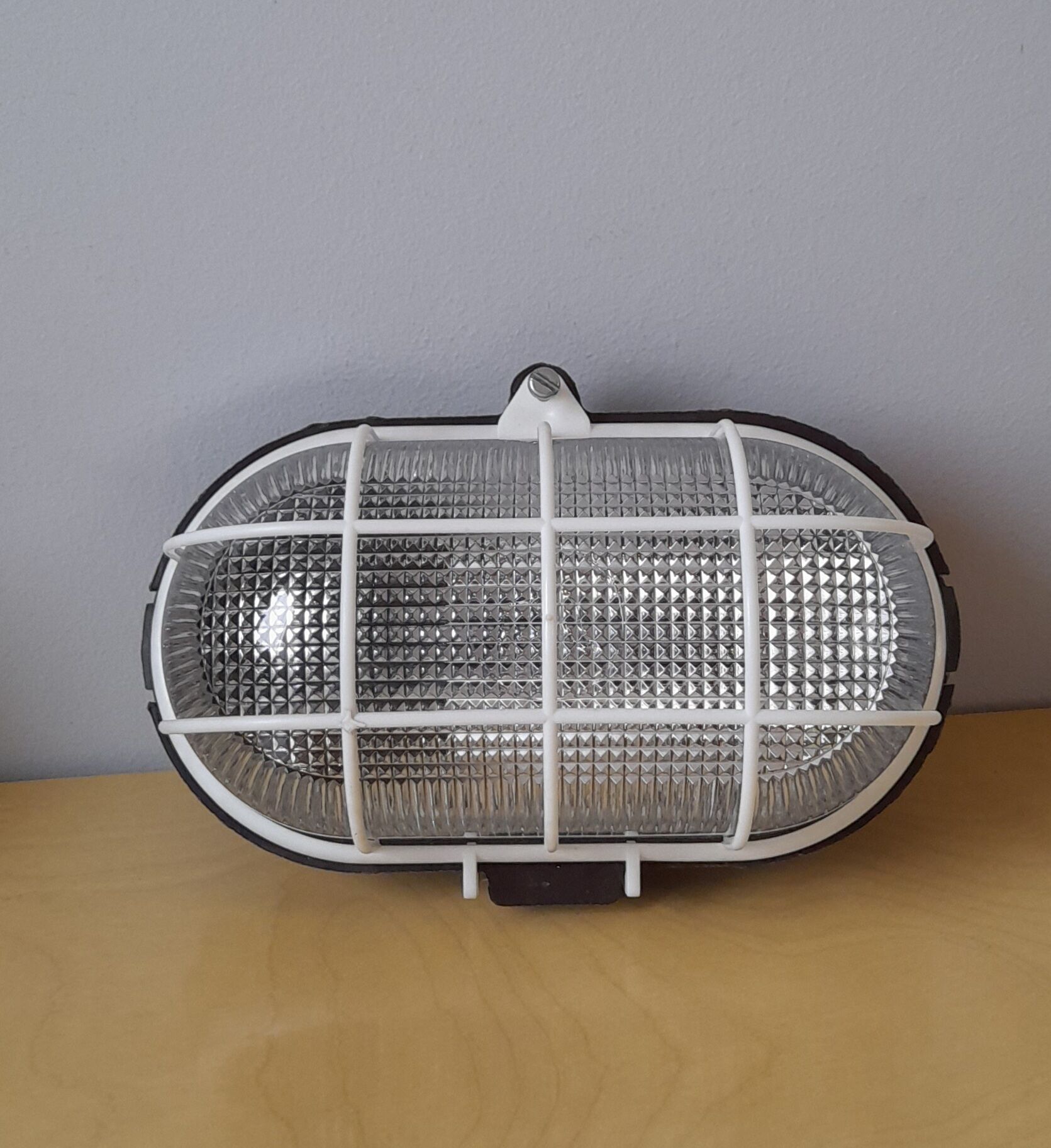 Ebonoid porthole lamp