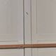 Pair of 19th-century cupboard doors and frame, woodwork