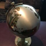 World map cigarette distributor globe
