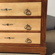 Old chest of drawers with white marble.