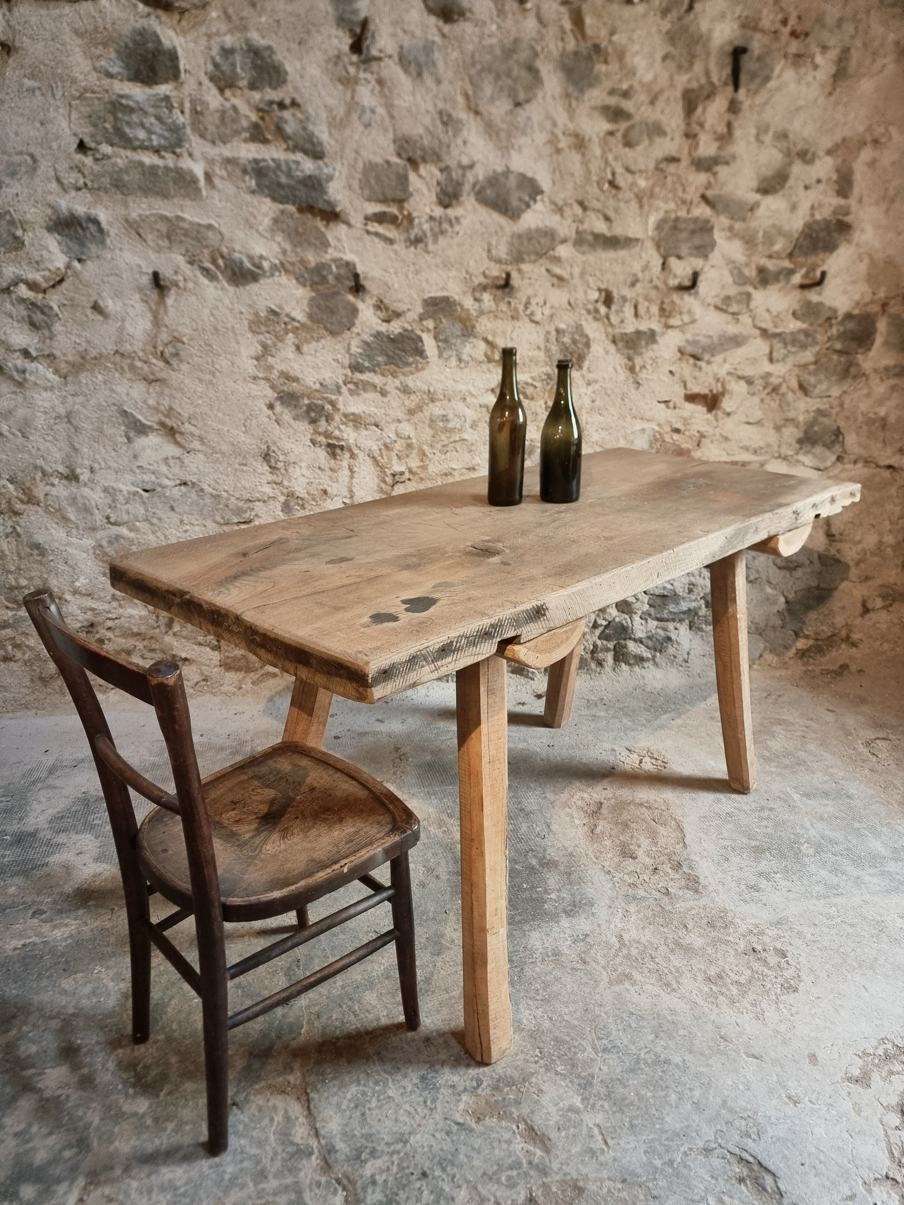Antique work table / primitive dining table in oak, Hungary, circa 1900–1930.