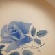 Large round stoneware serving platter from Digoin with a blue rose motif
