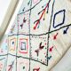 Off-white Moroccan rug with geometric patterns, 250cm x 150cm