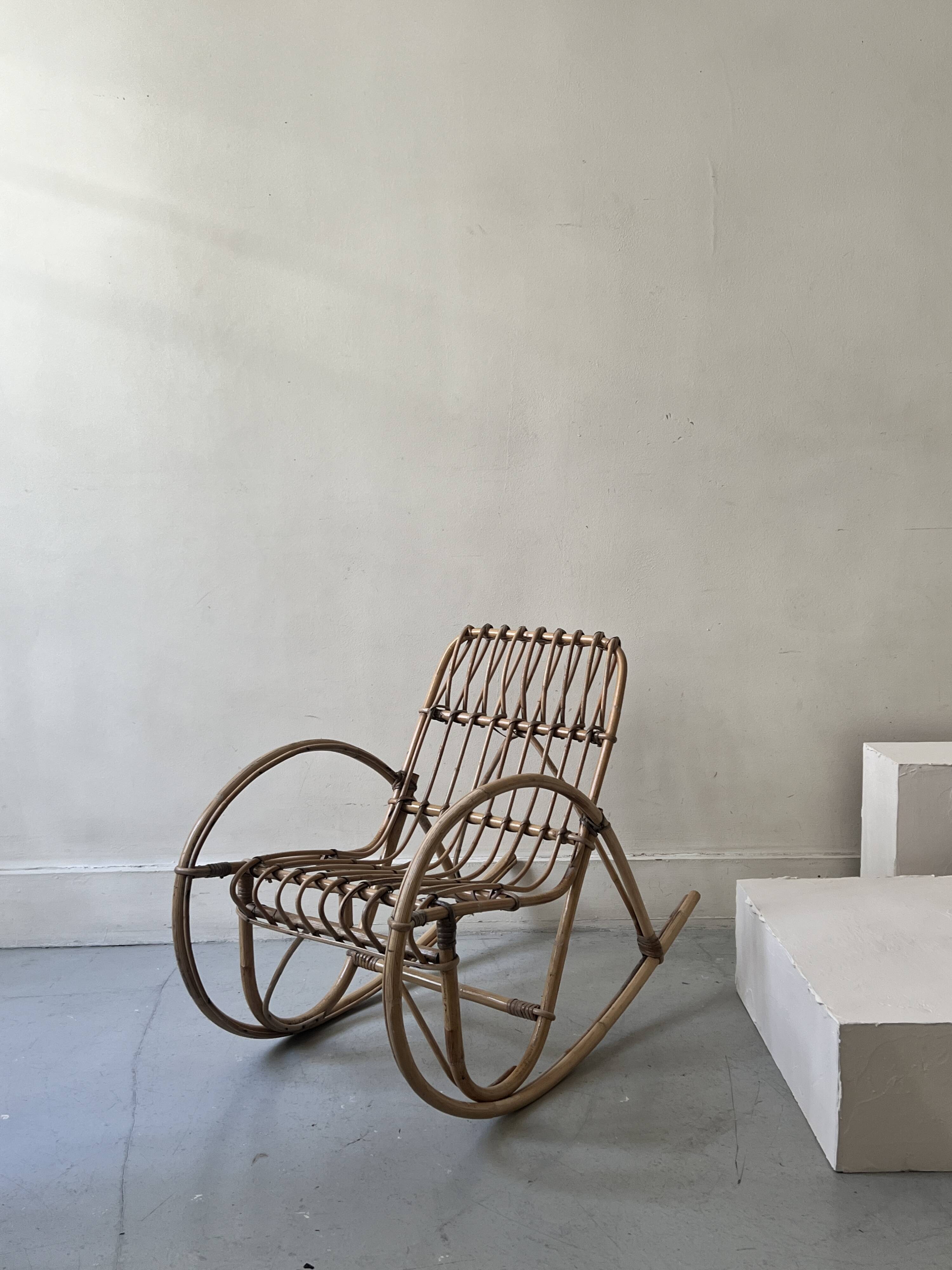 Child's rocking chair in rattan/bamboo, France 1950.